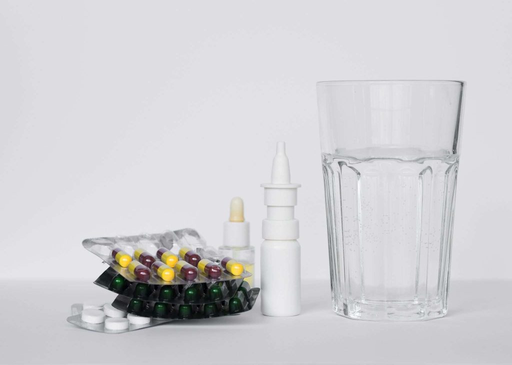 Assortment of effective piles medicine including ointments and oral tablets.